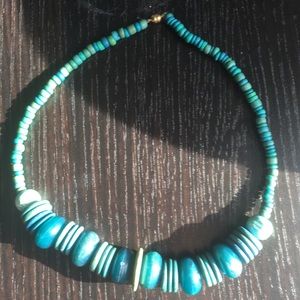 Turquoise colored beaded necklace